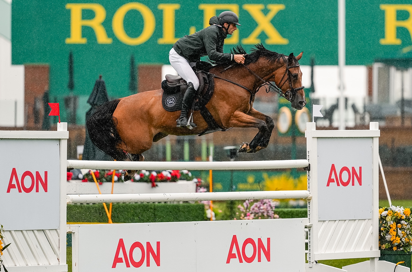 Richard Vogel (GER) and Gangster Montdesir Rise Above the Rain to Win the AON Grand Prix, Presented by Rolex